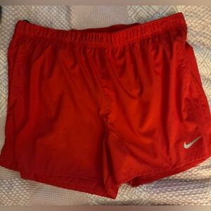 Nike Men's Red Athletic Shorts with Silver Swoosh